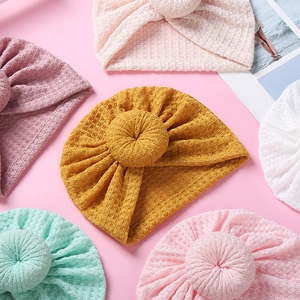 Cute donut waffle knit baby turban hats in five pastel colors for newborns and infants
