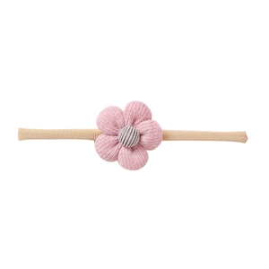 Close-up of pink fabric flower and striped center on soft nylon baby headband
