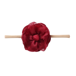 Detailed close-up of dark red chiffon flower baby headband with soft nylon elastic strap