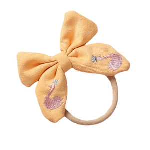 Bandeau à nœud brodé jaune pour bébés avec bande en nylon souple et motif de cygne