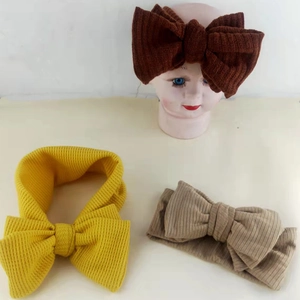 Three-piece baby ribbed knit headbands with oversized double-layered 3D bows in earth tones