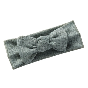 Bandeau élastique en maille jacquard pour bébé avec grand nœud en vert sauge