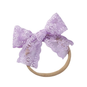 Soft nylon baby headband with lavender floral lace embroidery and a large bow design