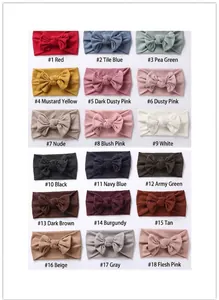 Detailed color chart of 18 ribbed knit baby bow headbands in various soft pastel shades