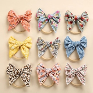 Set di fasce per neonati con fiocchi in cotone floreale e leopardato su nylon morbido