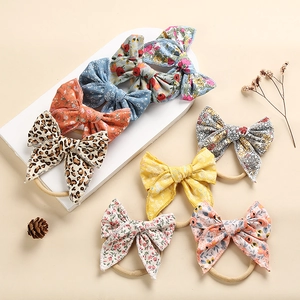 Set di 7 fasce con fiocchi in cotone floreale e leopardo per neonati e bambine