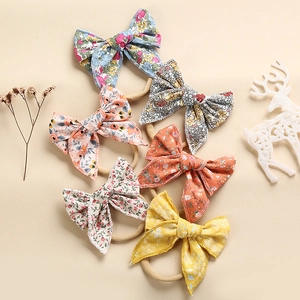 Set van 6 bloemenprint katoenen strik hoofdbanden voor pasgeboren baby's met nylon band