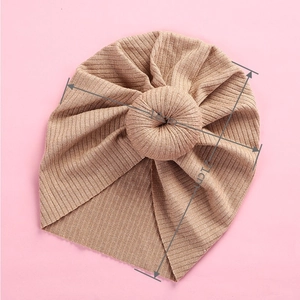 Ribbed knit baby turban hat in camel with donut knot detail, size 18cm by 21cm height