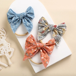 Set di fasce per neonata con fiocchi in cotone floreale blu, arancione e beige per bimbe