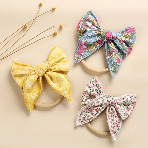 Set di 3 fasce per neonati con fiocchi in cotone floreale e morbide bande in nylon liscio