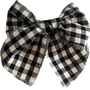 Nœud papillon à carreaux noir et blanc pour filles avec texture de tissu de qualité