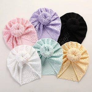 Lace hollow doughnut baby beanie hats in six colors including pink and purple