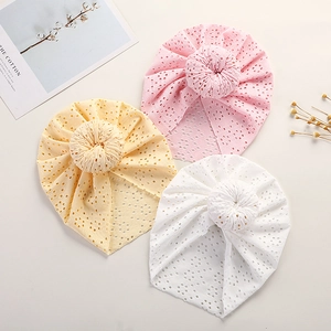 3-pack breathable eyelet cotton baby beanie hats with donut knots in pink, yellow, and white