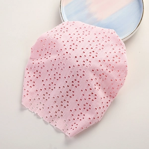 Pink eyelet lace baby beanie hat with floral hollow embroidery and scalloped edges