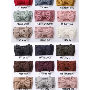Ribbed knit baby headbands with large bows in eighteen assorted vibrant colors