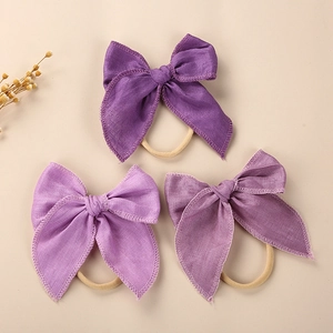 Three-piece set of purple linen bow headbands for baby girls with premium elastic bands