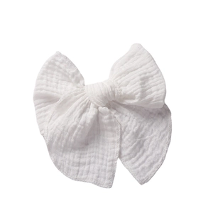 Classic white double-layer cotton muslin bow hair clip for girls with natural texture