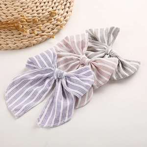 Lot de trois nœuds à cheveux rayés en violet, rose et gris pour petites filles