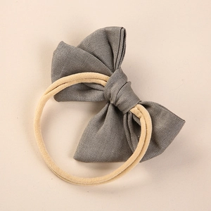 Grey linen bow headband for babies with soft seamless nylon band for newborns