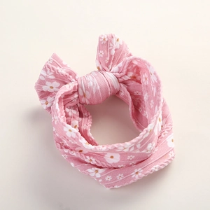 Soft pink floral nylon headband with bow for infants and toddlers stylish hair accessory