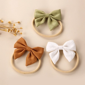 Driedelige linnen baby haarband set in olijf, karamel en crème met elastisch nylon