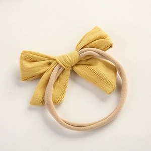 Handmade bright yellow cotton bow baby headband with soft high elasticity nylon band