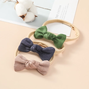 Lot de trois bandeaux bébé en lin vert, bleu et rose avec des bandes en nylon doux