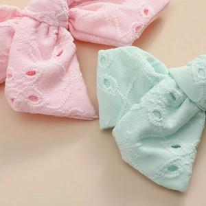 Barrettes à nœuds tricotés rose et vert menthe avec motifs ajourés pour filles