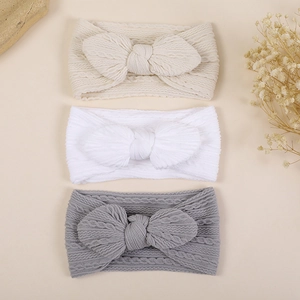 Lot de trois bandeaux bébé en nylon jacquard avec de grands nœuds en crème, blanc et gris