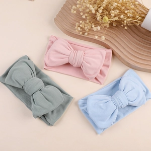 Three-pack soft milk silk baby headbands with large bows in Morandi pastel colors