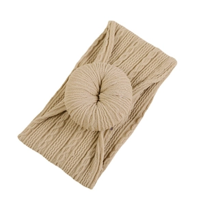 Bandeau bébé jacquard doux couleur chameau clair avec nœud donut et texture tricotée