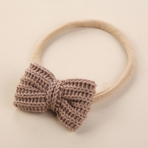 Bandeau bébé avec nœud tricoté et ruban en nylon élastique de couleur beige