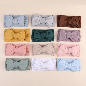 Set of 12 soft milk silk bow headbands for babies in assorted Morandi colors