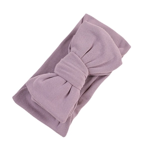 Soft purple milk silk headband with large bow for babies and toddlers, minimalist design