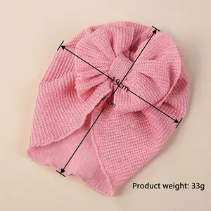 Pink knit baby turban hat with oversized double bow, size 19x21cm for infants