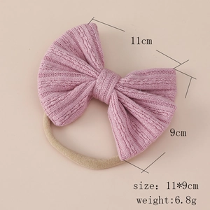 Pink jacquard knit bow baby headband with ultra-soft seamless nylon elastic band for girls