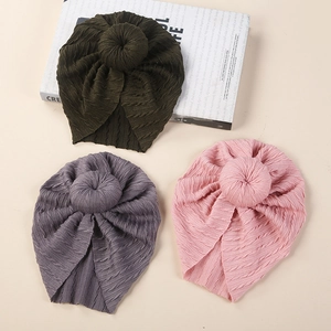 Three-piece set of knit baby donut hats in olive green, heather grey, and light pink