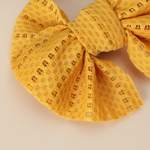 Fermaglio per capelli con fiocco a rete giallo zenzero per bambine con trama in pizzo