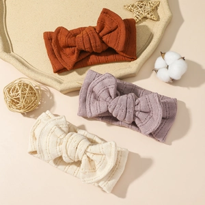 Set da tre pezzi di fasce per neonati in cotone lavorato a maglia con fiocchi caldi