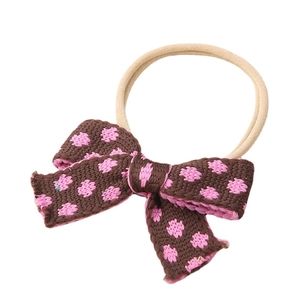 Knitted baby floral bow headband with pink dots on brown fabric and soft nylon strap