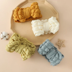 Bandeaux bébé élastiques en seersucker avec grands nœuds en jaune, blanc, vert et bleu