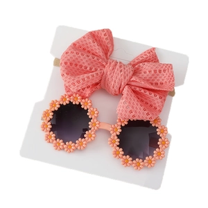 Pink mesh bow headband and daisy sunglasses set for baby girls on white background