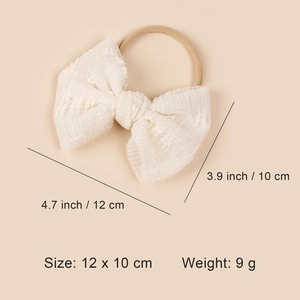 Detailed view of cream lace bow baby headband with soft nylon strap and size dimensions