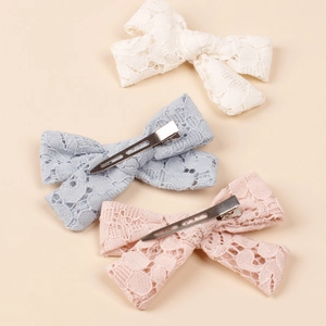 Lace bow hair clips for girls set in white light blue and pink with metal duckbill clips