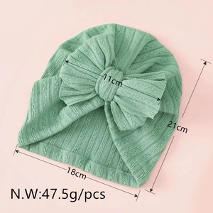 Mint green baby turban hat with large bow and soft ribbed knit texture, 18x21cm size