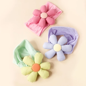 Three-piece baby floral headbands with soft padded flower decorations in candy colors