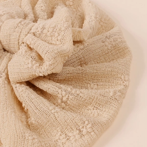 Soft stretch mesh baby turban hat with double layer bow detail in beige textured knit