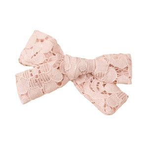 Pink lace bow hair clip featuring elegant hollow flower textures on a white background