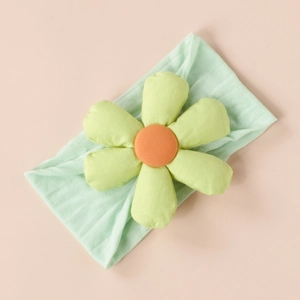 Detailed close-up of mint green floral baby headband with 3D padded flower decoration