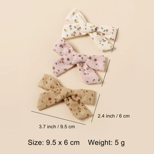 Lot de trois barrettes à fleurs pour filles en tissu de styles crème rose et kaki